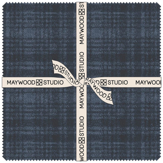 Maywood Studio Woolies Flannel Stormy Seas bundle of precut dark blue flannel squares stacked and ready for quilting projects.