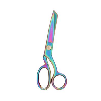 Tula Pink micro serrated bent trimmer fabric scissors with stainless steel blades and curved handles designed for precise quilting and sewing cuts.

